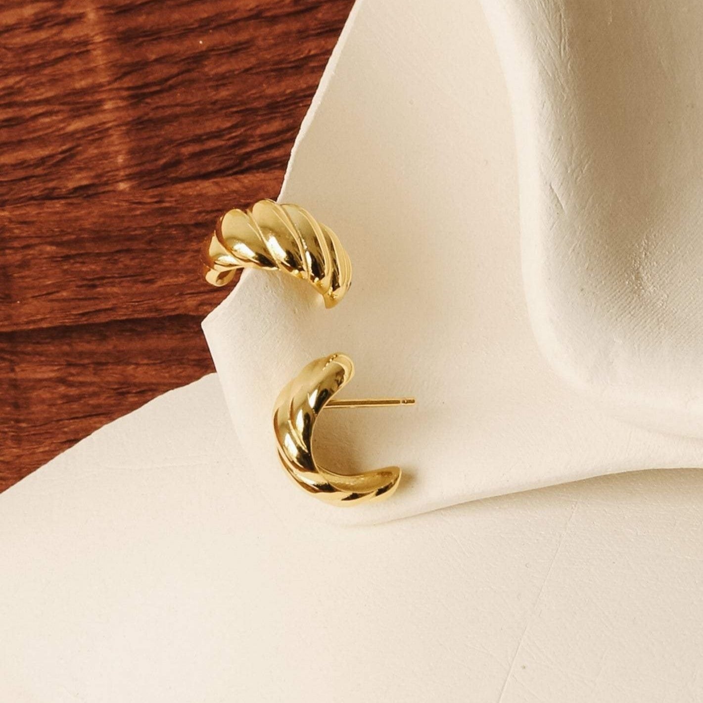 Embrace Parisian Elegance with Croissant Mini Hoop Earrings